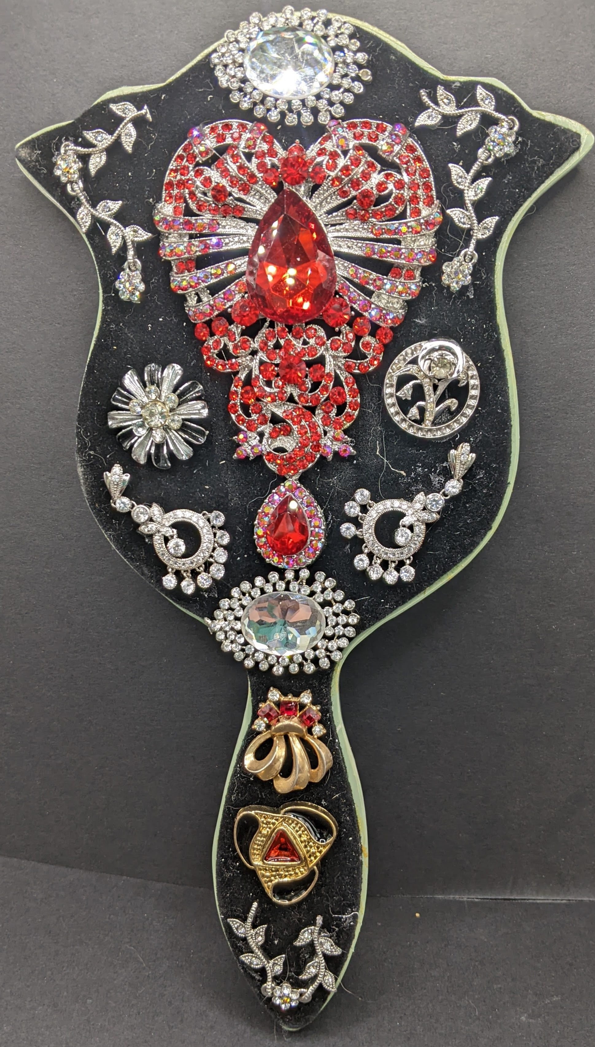 Princess hand mirror with vintage jewelry