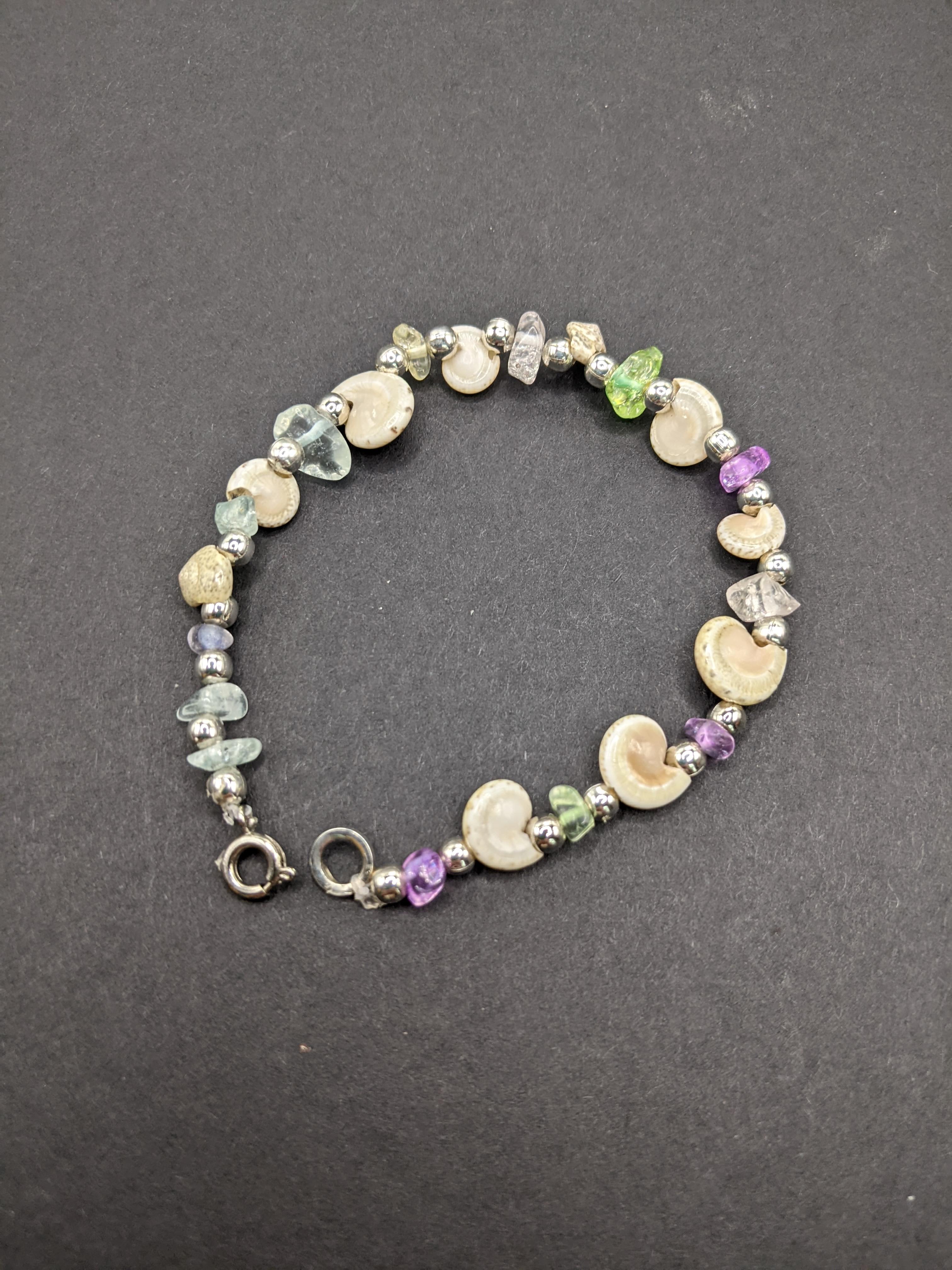 Spiral shells and glass bits bracelet