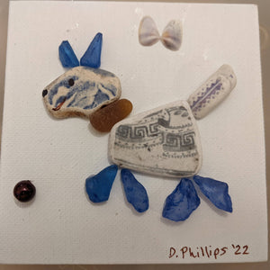 Large blue sea pottery dog with ball and butterfly