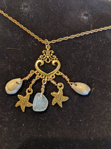 Cowry shell, seaglass, and starfish necklace