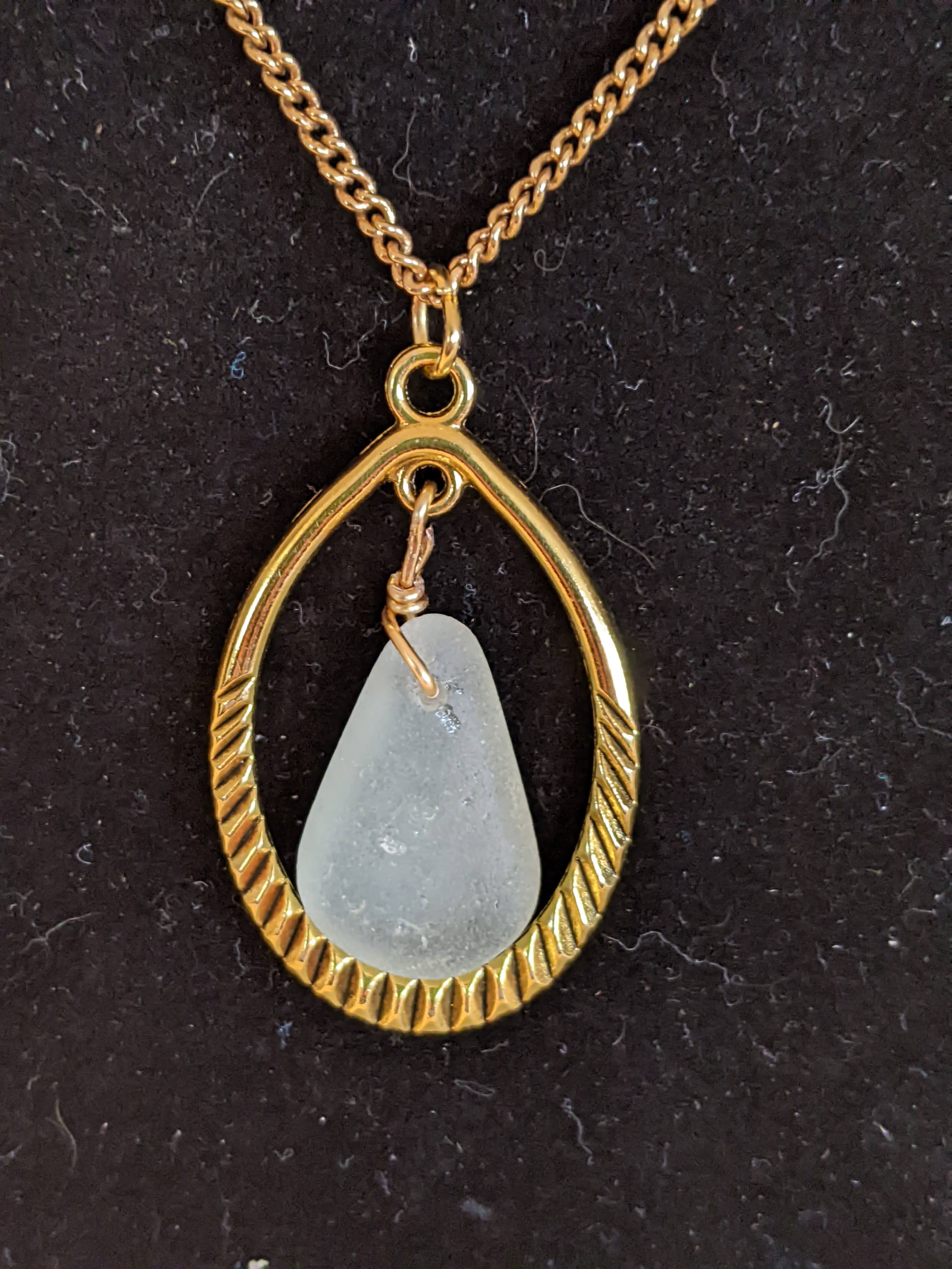 Gold necklace with white seaglass