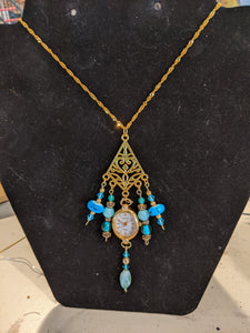 Gold watch necklace with turquoise beads
