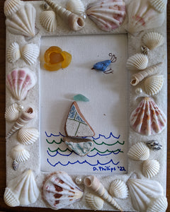 Sailboat in shell frame