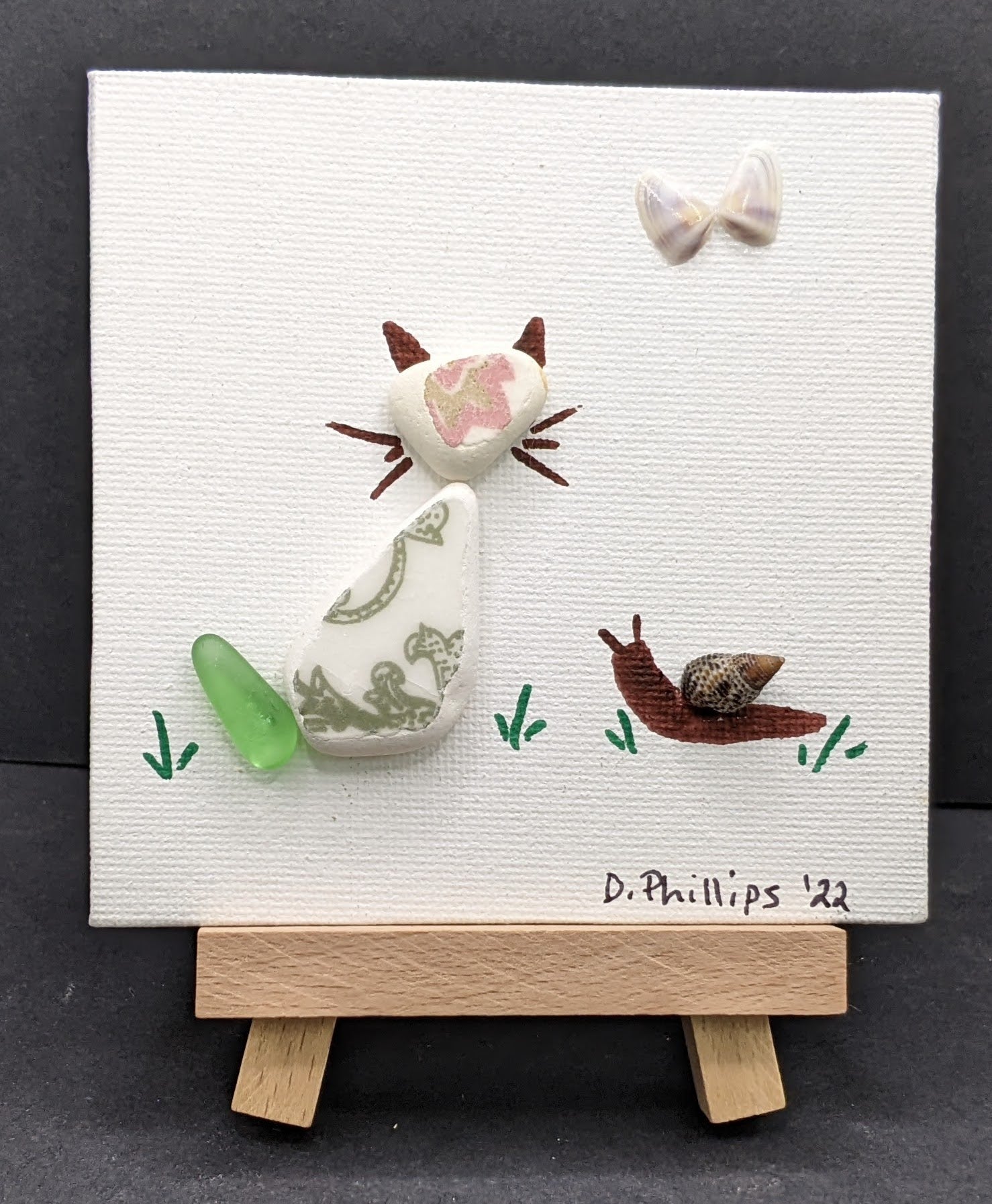 Cat, butterfly, and snail