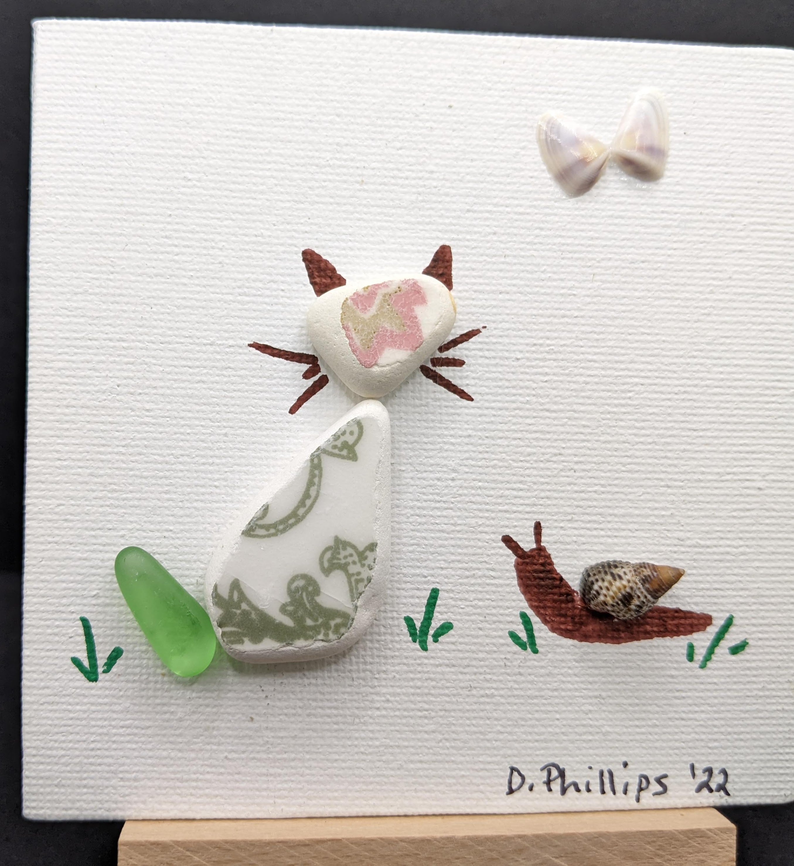 Cat, butterfly, and snail