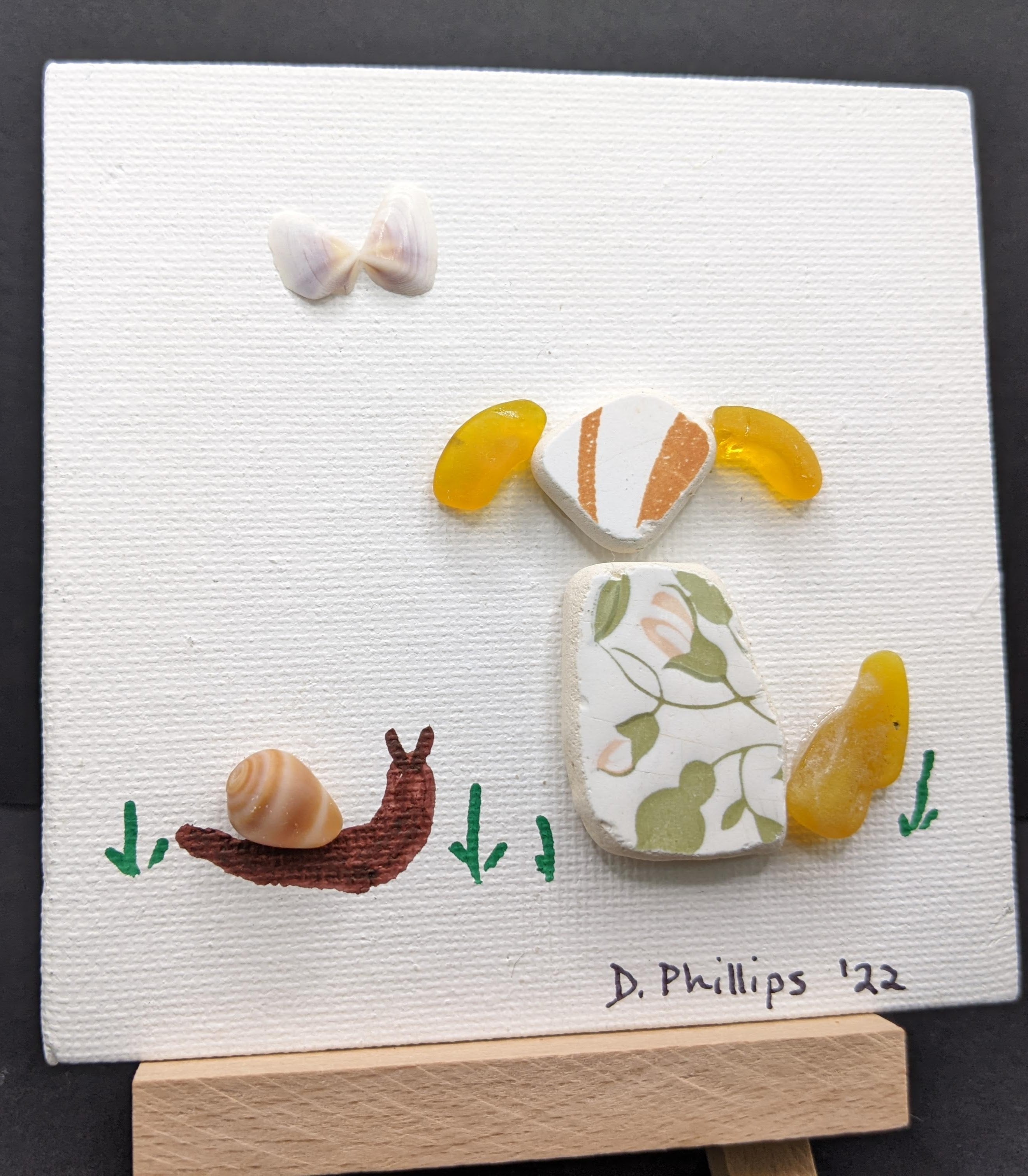 Sea pottery dog, butterfly, and snail