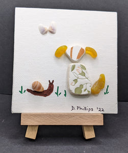 Sea pottery dog, butterfly, and snail