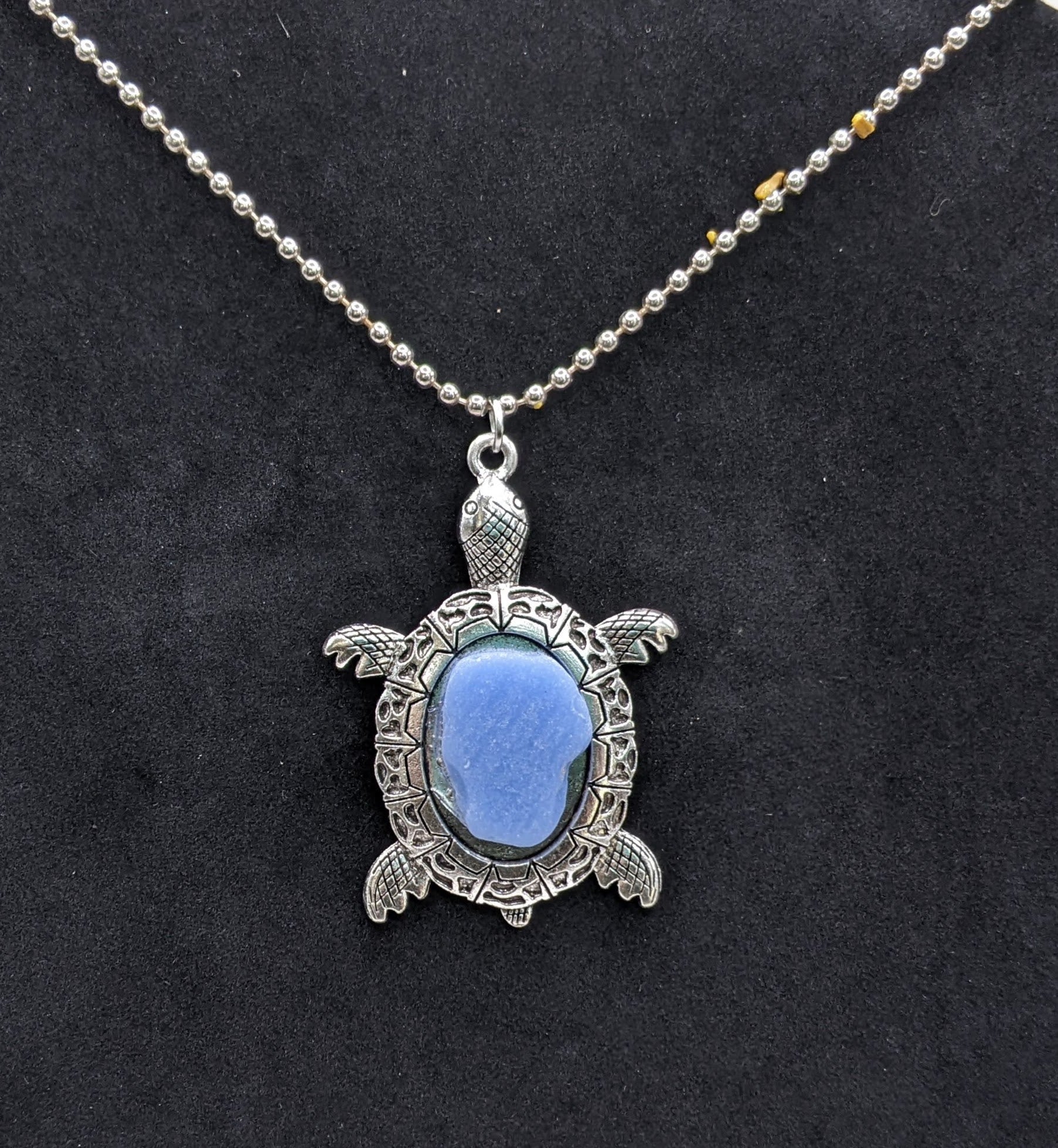 Silver turtle pendant with blue tile
