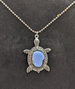 Silver turtle pendant with blue tile