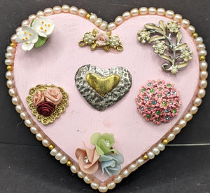 Small pink heart with vintage jewelry