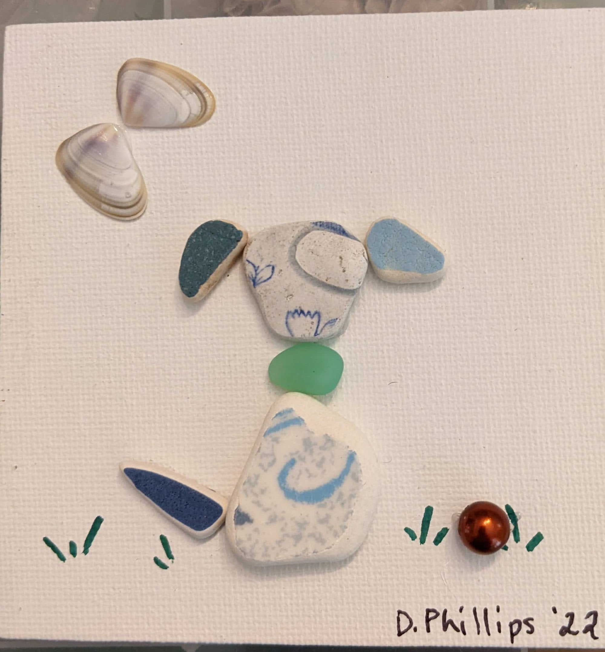 Blue sea pottery dog with ball and butterfly