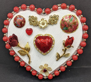 Small white heart with vintage jewelry